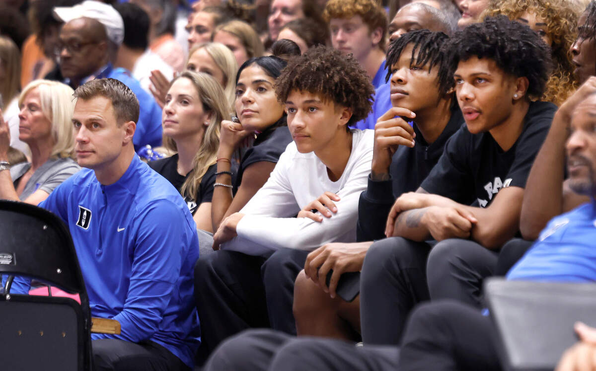 From left Duke head coach Jon Scheyer, Marcelle Scheyer, General Manager Rachel Baker, Nate Ament, Shelton Henderson and Acaden Lewis watch during Countdown to Craziness at Cameron Indoor Stadium in Durham, N.C., on Friday, Oct. 4, 2024.