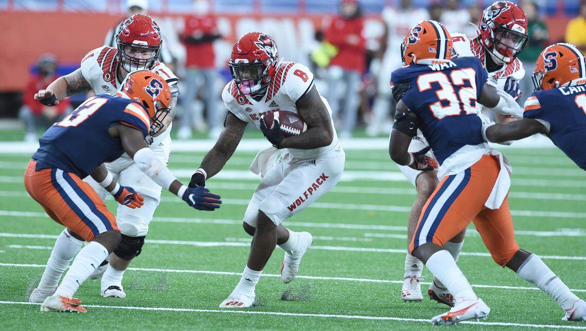 North Carolina State Wolfpack running back Ricky Person Jr. (8) looks for yard during a game against Syracuse on Saturday, Nov. 28, 2020, at the Carrier Dome in Syracuse, N.Y.