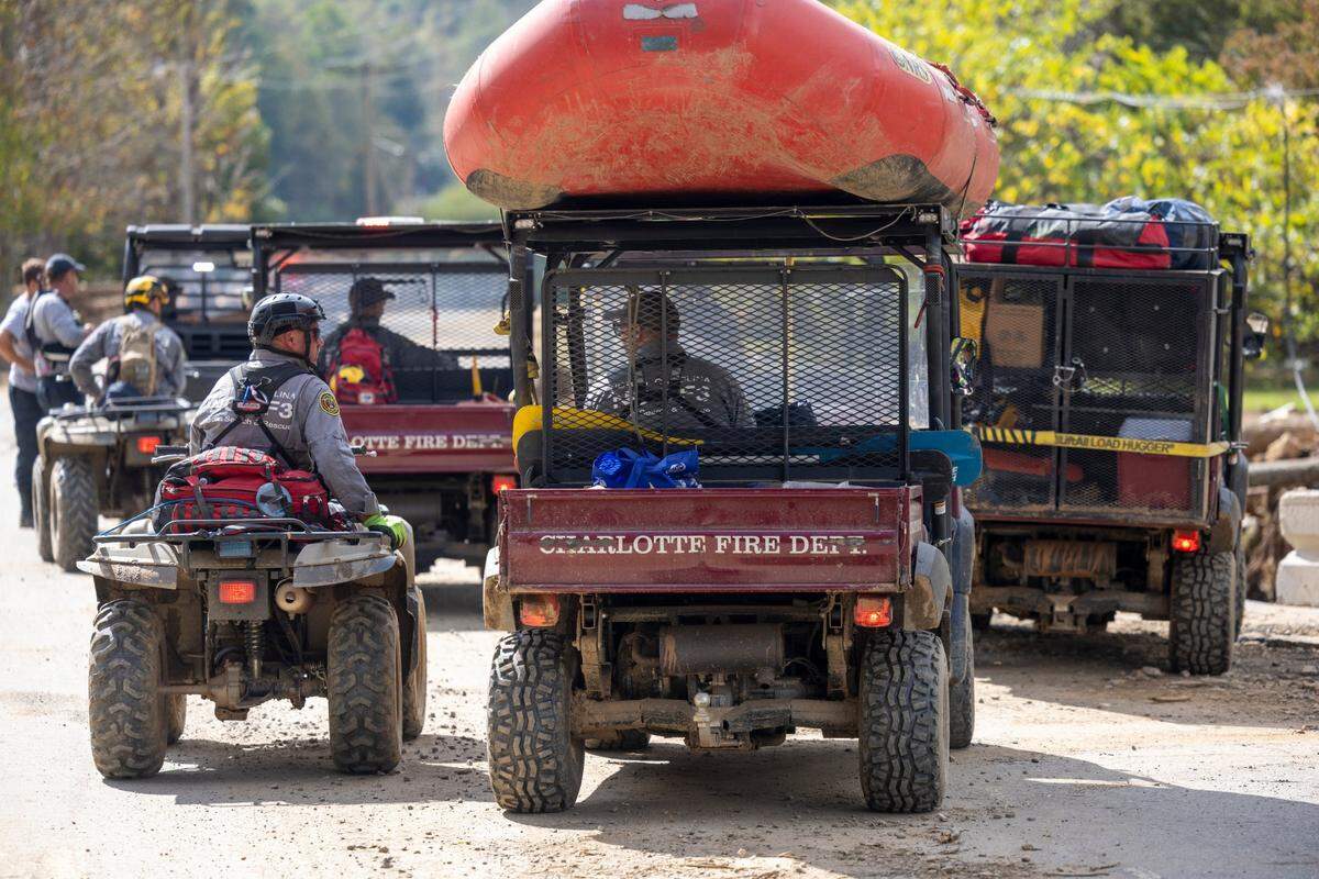 Members of the Charlotte Fire Department arrive in Pensacola, N.C. to search for victims of Hurricane Helene on Thursday, October 3, 2024, in the Yancey County.