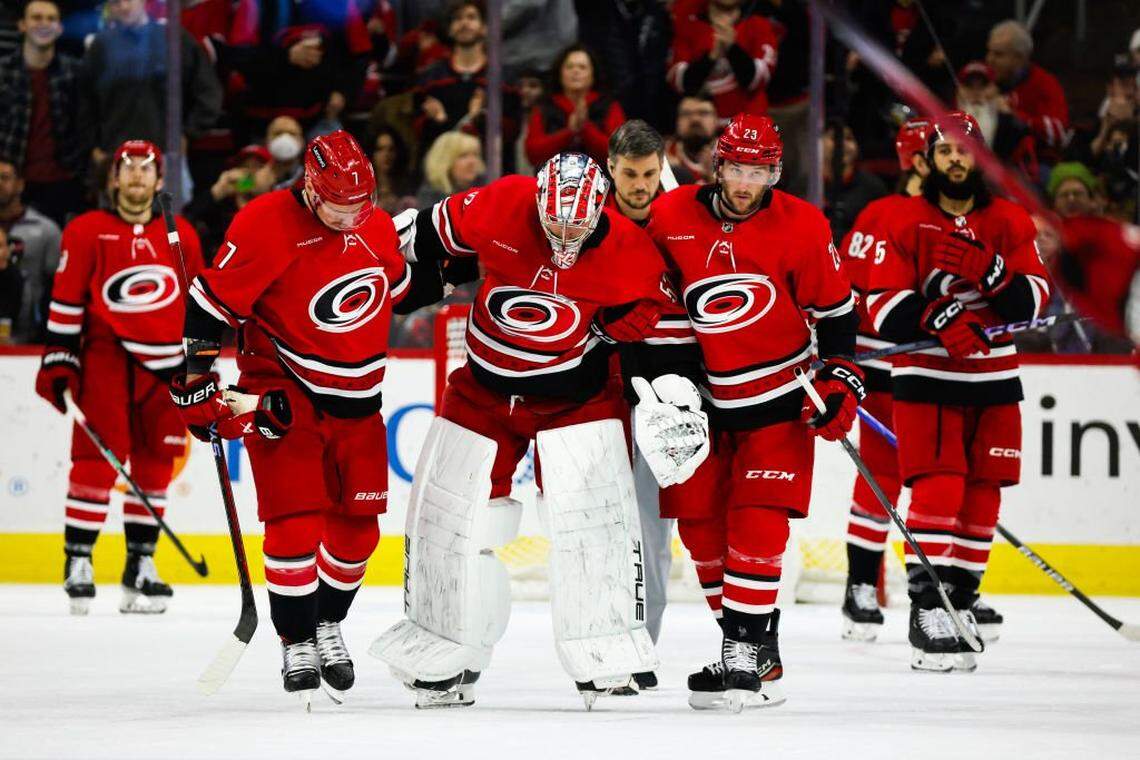 Pyotr Kochetkov of the Carolina Hurricanes leaves the ice injured during the second period of the game against the Anaheim Ducks at PNC Arena on January 11, 2024 in Raleigh, North Carolina. 