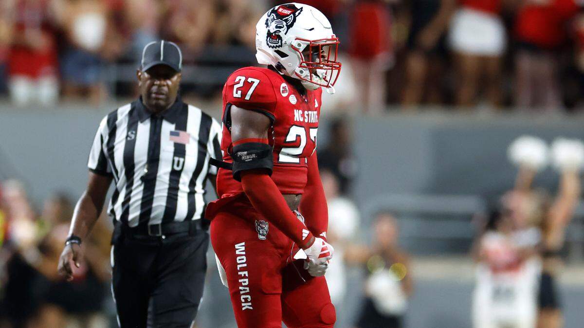N.C. State linebacker Jayland Parker (27) celebrates a stop during the first half of N.C. State’s game against Western Carolina at Carter-Finley Stadium in Raleigh, N.C., Thursday, August 29, 2024.