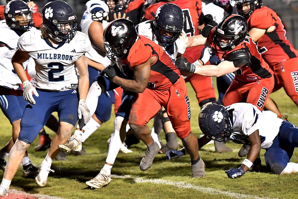 Rolesville running back Devon Thomas (0) runs for touchdown against the Millbrook defense during the second half. The Rolesville Rams and the Millbrook Wildcats met in a football game in Raleigh. N.C. on October 11, 2024.