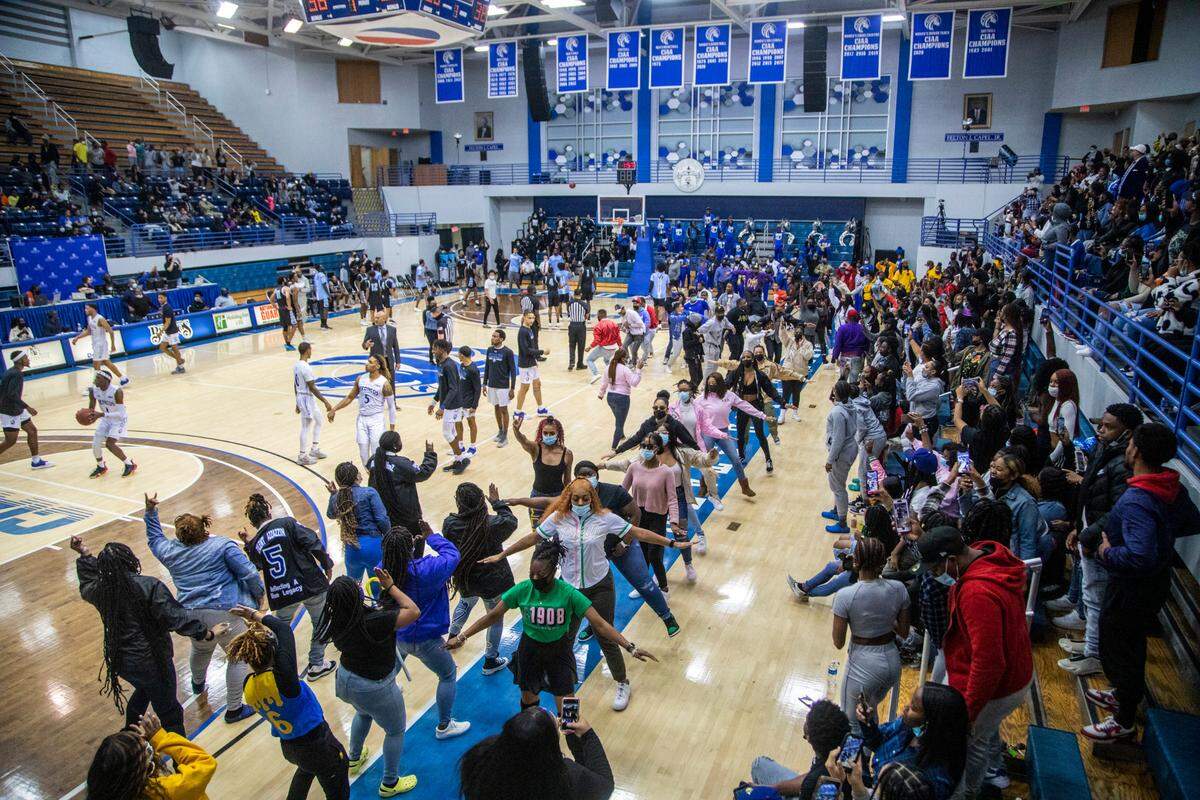 Fayetteville State University fans celebrate a men’s basketball team win over Livingstone at Fayetteville State Wednesday, Jan. 19, 2022.