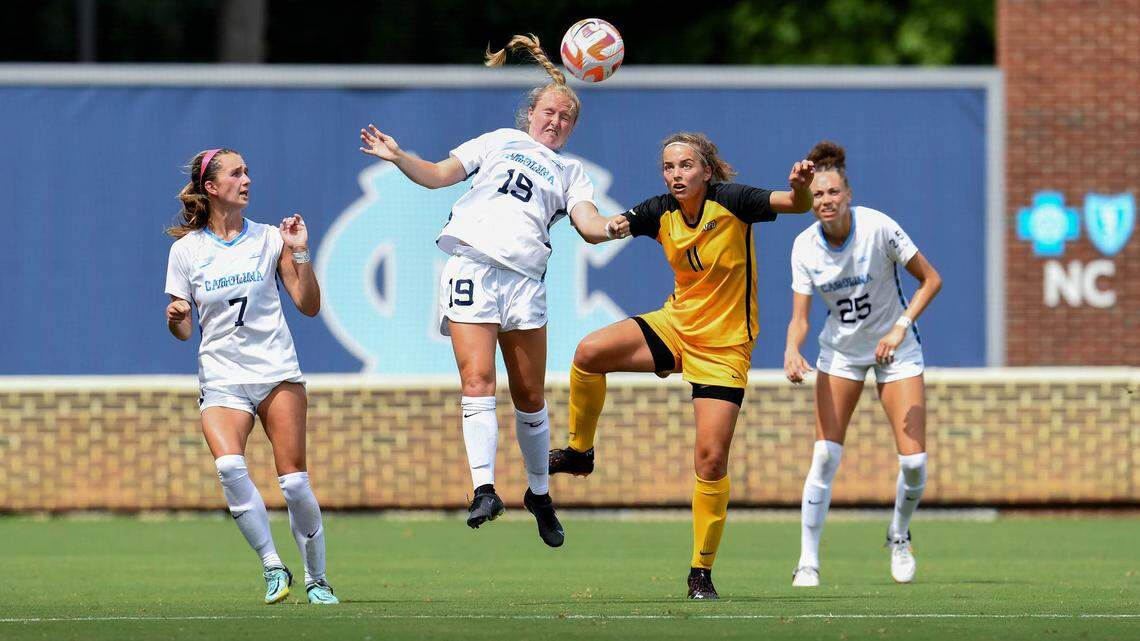 Emily Colton of the University of North Carolina heads the ball against VCU during a game at Dorrance Field in Chapel Hill on Sunday, August 7, 2022. Colton and the Tar Heels are ready to avenge what they felt was a sub-standard 2021 campaign.