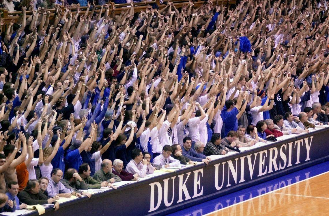 The Cameron Crazies put their arms up during a Duke foul shot at Cameron Indoor Stadium in 2001 when Duke played Wake Forest.
