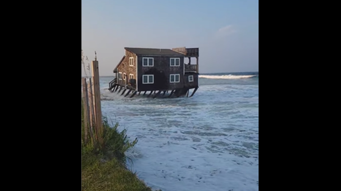 This video image shows the moment the pilings under the house began to snap, leaving it floating in the ocean.