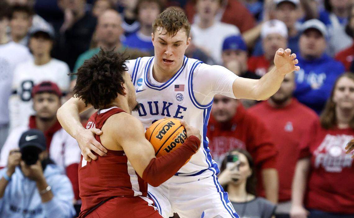 Duke’s Cooper Flagg (2) defends Alabama’s Mark Sears (1) during the second half of Duke’s 85-65 victory over Alabama in their Elite 8 game in the 2025 NCAA Men’s Basketball Championship at the Prudential Center in Newark, N.J., Saturday, March 29, 2025.