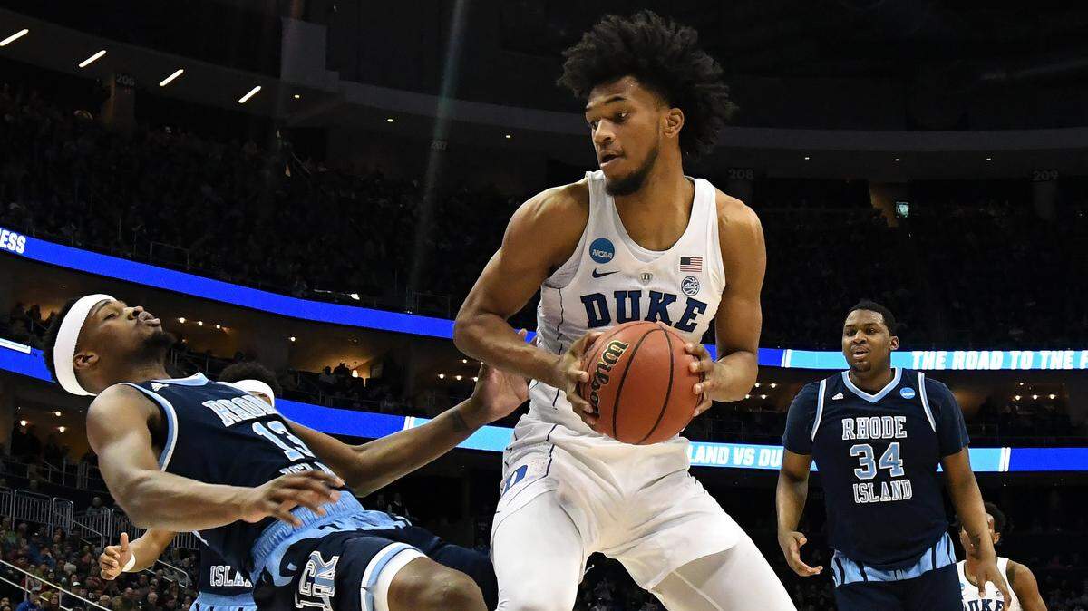 Duke forward Marvin Bagley III (35) moves towards the basket in the first half against Rhode Island guard Stanford Robinson (13).