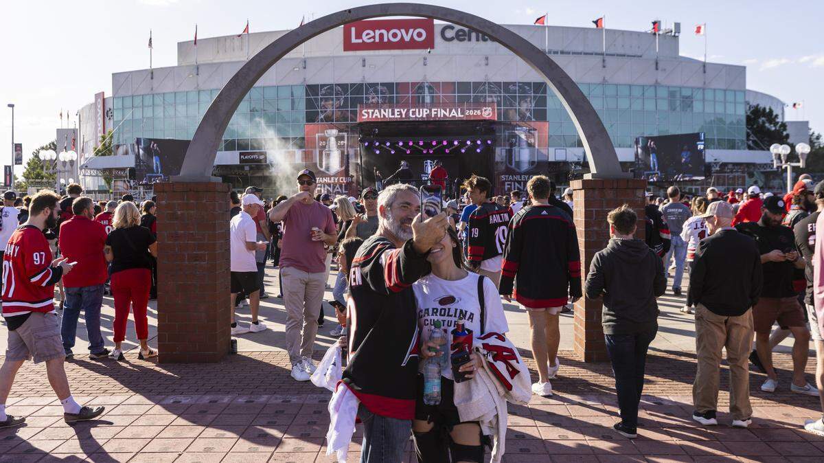 Carolina Hurricanes fans get ready for Game 1 of the Stanley Cup Final outside the Lenovo Center in Raleigh on Tuesday, June 2, 2026. For the first time since 2006, the Hurricanes are playing in the Stanley Cup Final, facing the Vegas Golden Knights, who won the Stanley Cup in 2023.