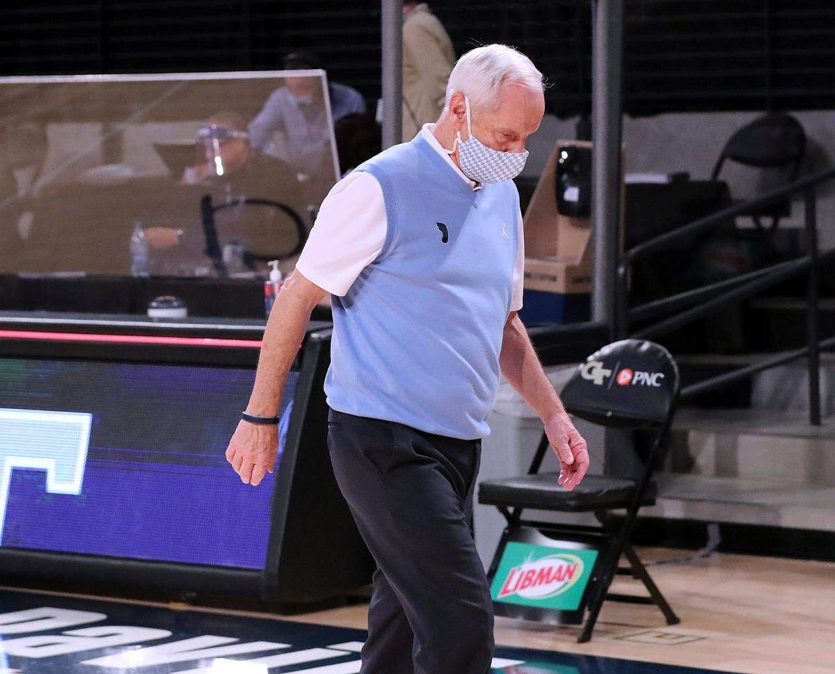North Carolina coach Roy Williams walks off the court after the team’s loss to Georgia Tech in an NCAA college basketball game Wednesday, Dec. 30, 2020, in Atlanta.