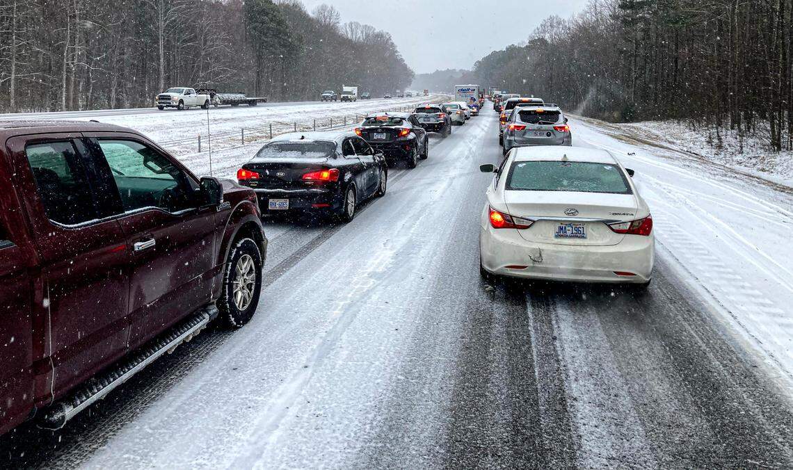 Traffic is backed up on U.S. 64 East near Wendell, N.C., on Feb. 19, 2025 as snow, sleet and rain hit North Carolina.