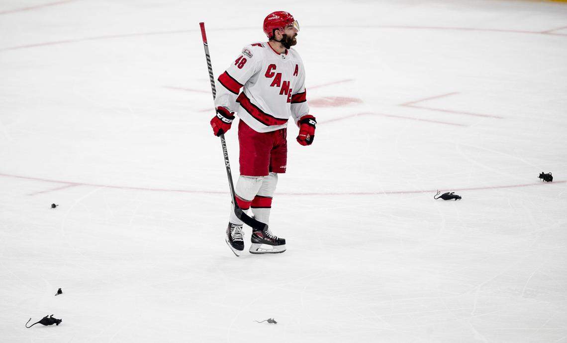 The Carolina Hurricanes Jordan Martinook (48) skates to the bench amid a shower of rats during the closing minutes of play against the Florida Panthers in the third period of Game 3 of the Eastern Conference Finals on Monday, May 22, 2023 at FLA Live Arena in Sunrise, Fla.