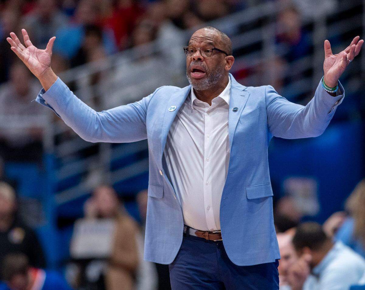 North Carolina coach Hubert Davis directs his team in the first half against Kansas on Friday, November 8, 2024 at Allen Fieldhouse in Lawrence, Kansas.