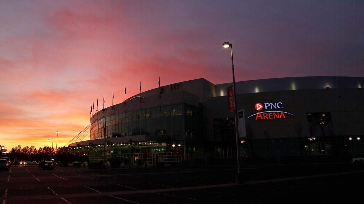 The sun sets outside the building before an NHL game played between the Carolina Hurricanes and the Pittsburgh Penguins at PNC Arena in Raleigh, N.C. on Dec. 29,  2017.  This Season, a half dozen Canes games will feature foodie dinners prepared by North Carolina chefs.