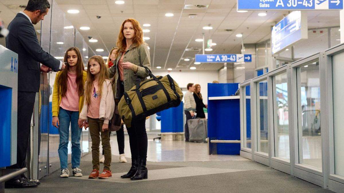 Sarah Drew stars as Lisbeth Meredith in the Lifetime movie “Stolen By Their Father.”
