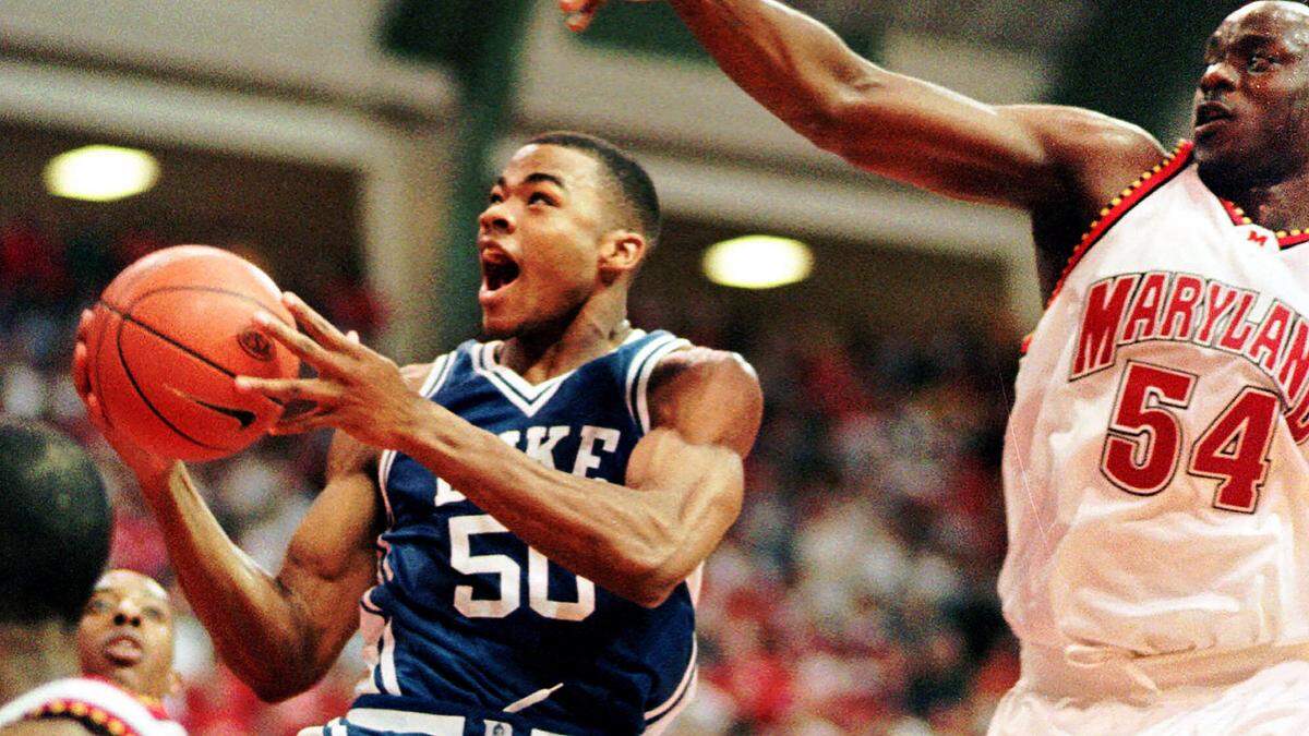 Duke’s Corey Maggette (50) goes to the basket against Maryland’s Obinna Ekezie (54) during the first half of Duke’s 82-64 win Sunday, Jan. 3, 1999, at Cole Field House in College Park, Md.(AP Photo/Nick Wass)