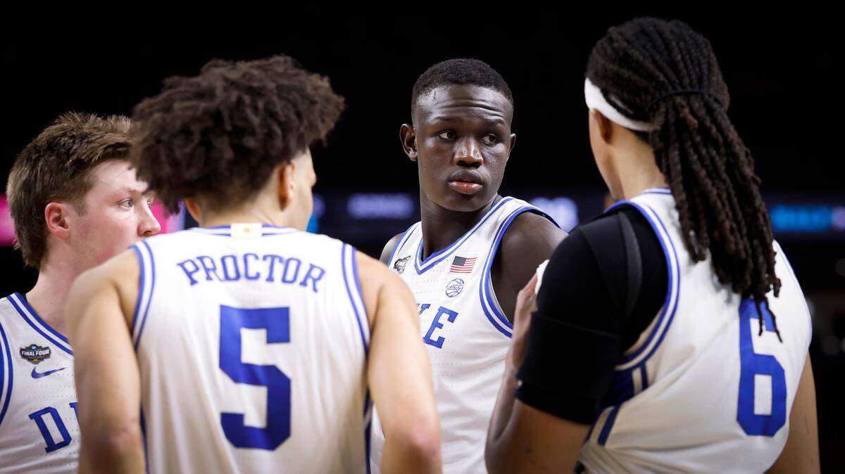 Duke’s Khaman Maluach in the huddle with other Blue Devils players during their Final Four game against Houston.