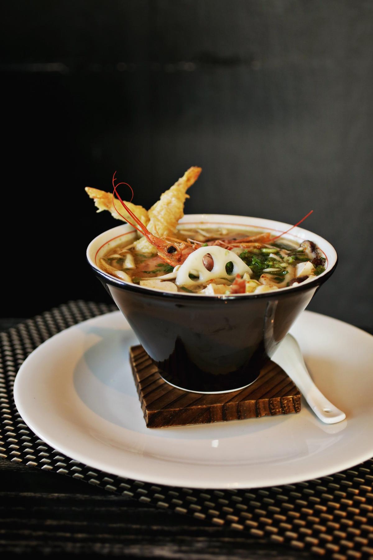 Fusion Fish’s supeu (which the menu informs you is a Japanese style soup) earns its star billing with fat udon noodles, shiitake mushrooms and scallions in a soul-satisfying miso-clouded dashi broth with your choice of protein.