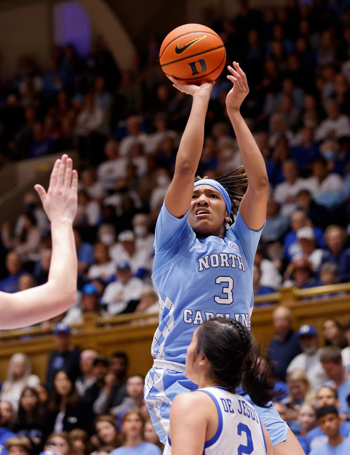 North Carolina’s Kennedy Todd-Williams shoots over Duke’s Vanessa de Jesus during the second half half of the Tar Heels’ 45-41 win over Duke on Sunday, Feb. 26, 2023, at Cameron Indoor Stadium in Durham, N.C.