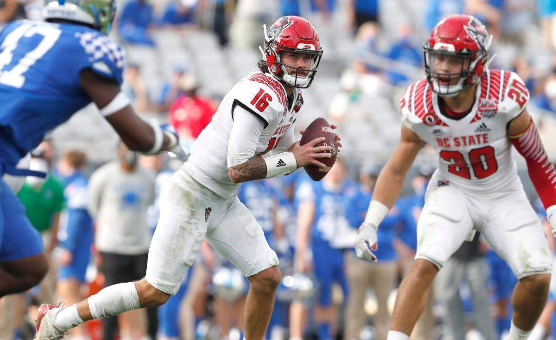 N.C. State quarterback Bailey Hockman (16) looks to pass during the second half of Kentucky’s 23-21 victory over N.C. State in the Gator Bowl at TIAA Bank Field in Jacksonville, Fla., Saturday, January 2, 2021.