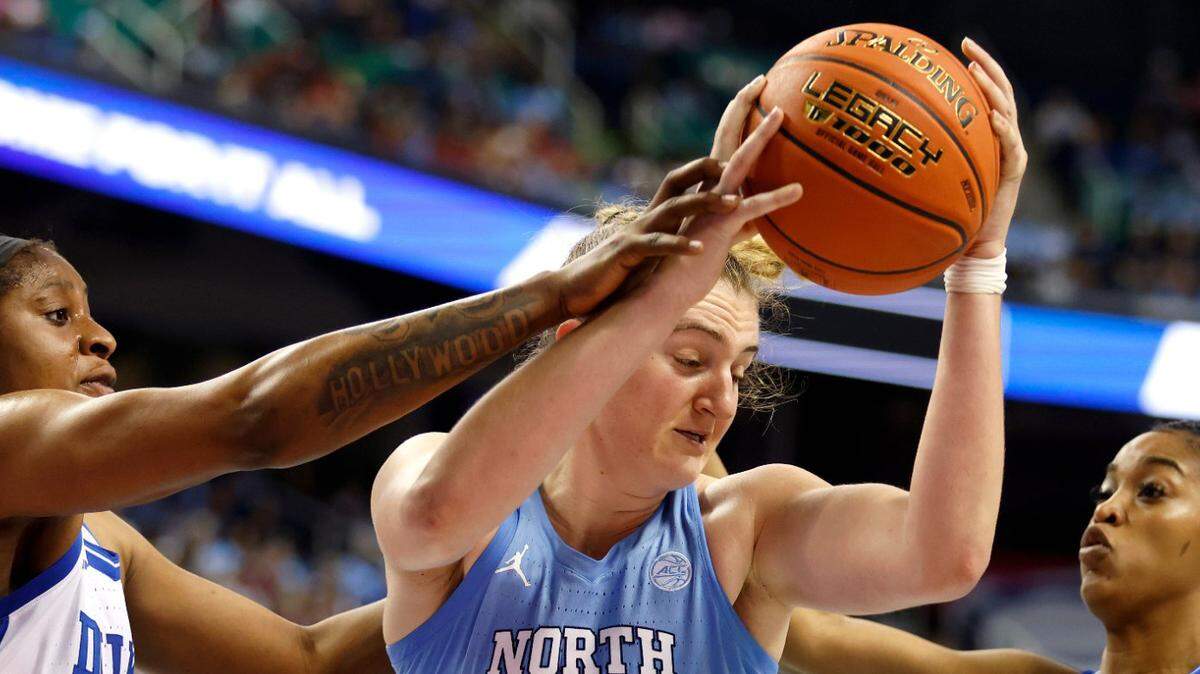 Duke’s Elizabeth Balogun and Ashlon Jackson defend North Carolina’s Alyssa Ustby in a full-court press during the second half of the Blue Devils’ 44-40 win over North Carolina in an ACC Women’s Basketball Tournament quarterfinal game on Friday, March 3, 2023, at Greensboro Coliseum in Greensboro, N.C.