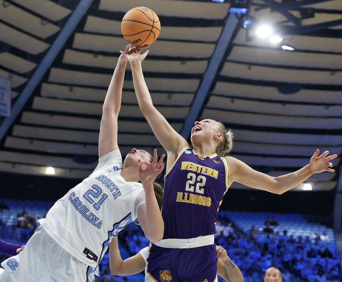North Carolina’s Ciera Toomey battles for a rebound with Western Illinois’ Mia Nicastro during the first half of the Tar Heels’ 82-51 first-round NCAA Tournament win on Friday, March 20, 2026, at Carmichael Arena in Chapel Hill, N.C.
