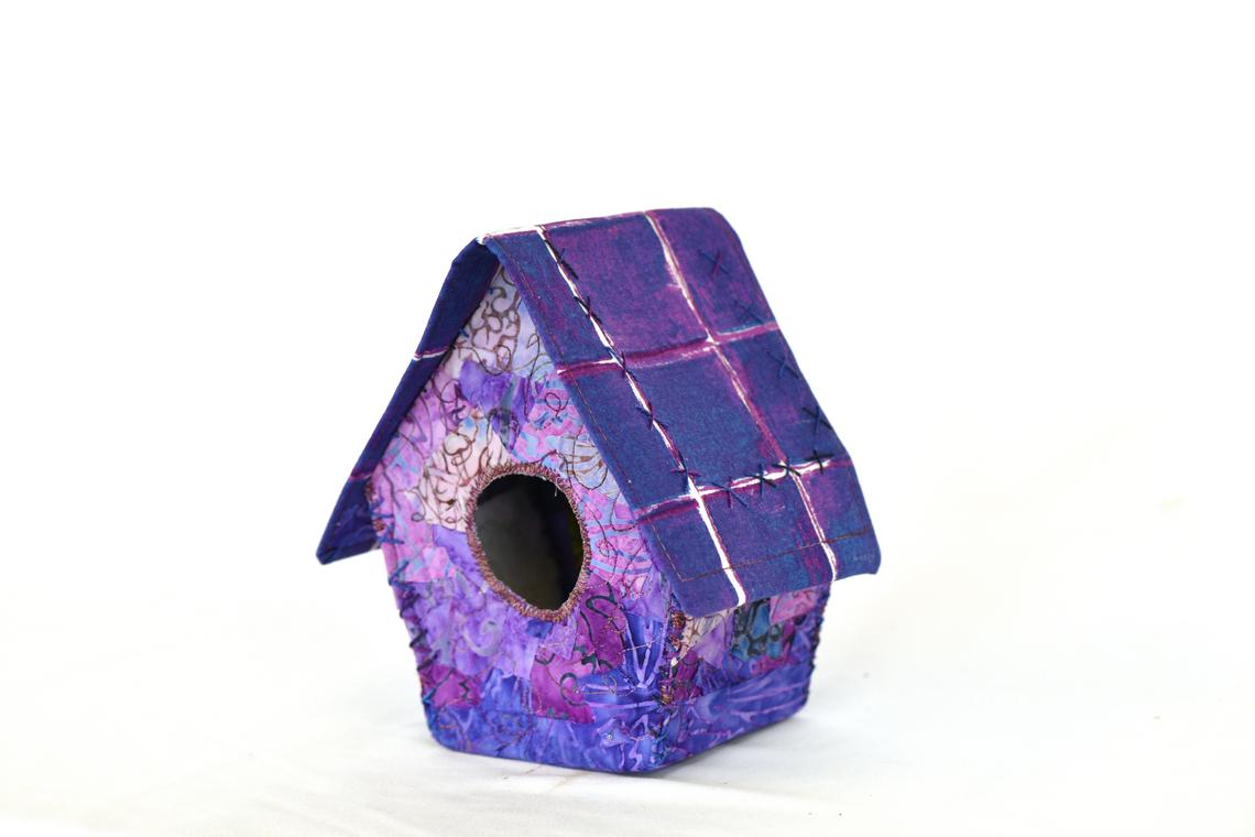 Adult Flights of Fancy 1st place is Susan Lamatrice's "Cozy Quilted Cottage."