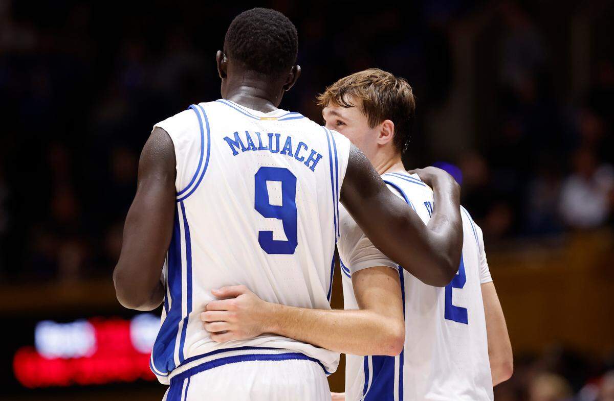 Duke’s Cooper Flagg (2) talks with Khaman Maluach (9) during the second half of Duke’s 107-56 exhibition victory over Lincoln (Pa) University at Cameron Indoor Stadium in Durham, N.C., Saturday, Oct. 19, 2024.