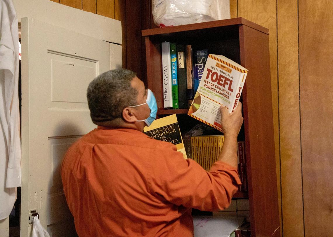 JosŽ Chicas starts to pack his belongings the day before leaving the School for Conversion where he has spent the last three years and seven months in sanctuary from deportation, on Thursday, Jan. 21, 2021, in Durham, N.C.