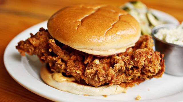 Picnic’s take on the fried chicken sandwich stands alone among Southern barbecue spots. Picnic starts with a boneless thigh and tops it with pickled onions and Old Bay aioli.