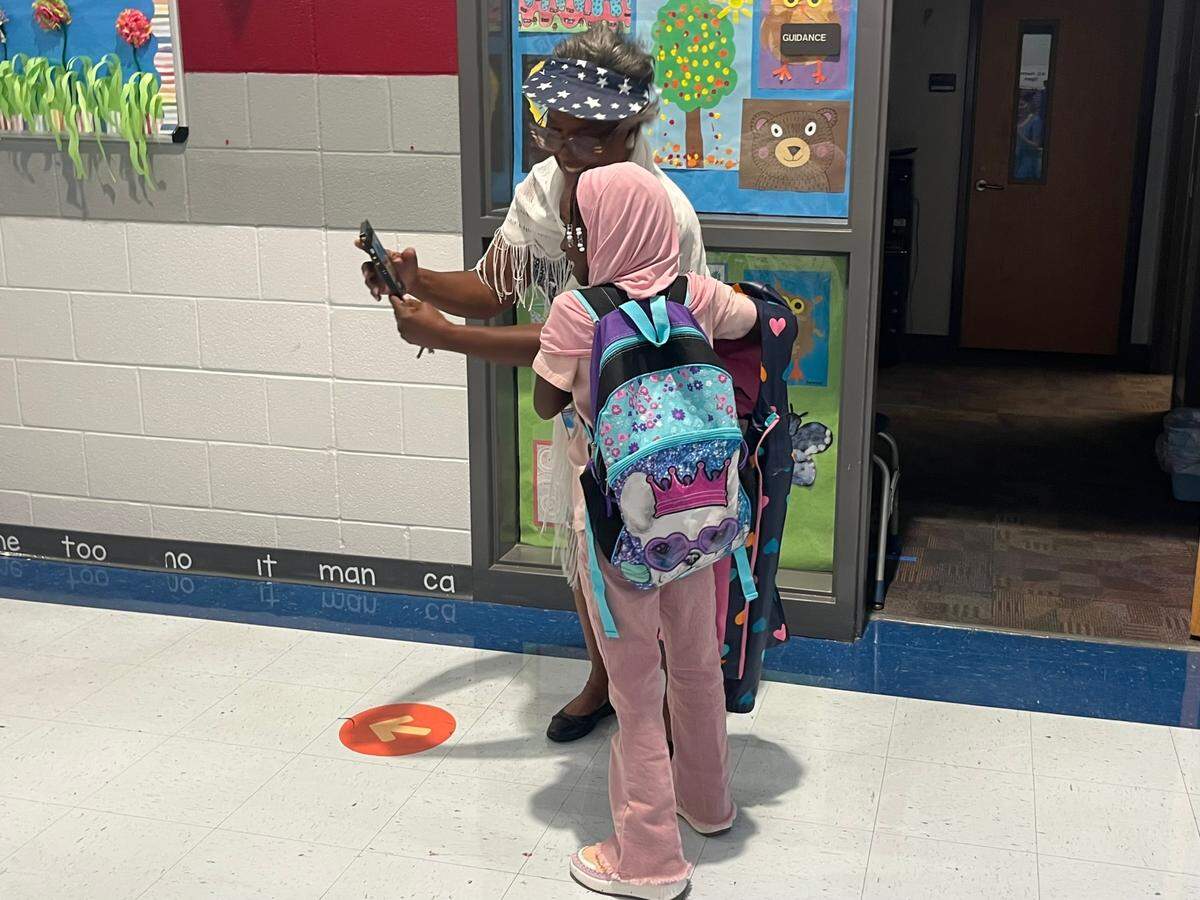 Students and teachers reunite on the first day at W.G. Pearson Elementary School, which is now a year-round option for anyone in Durham Public Schools.