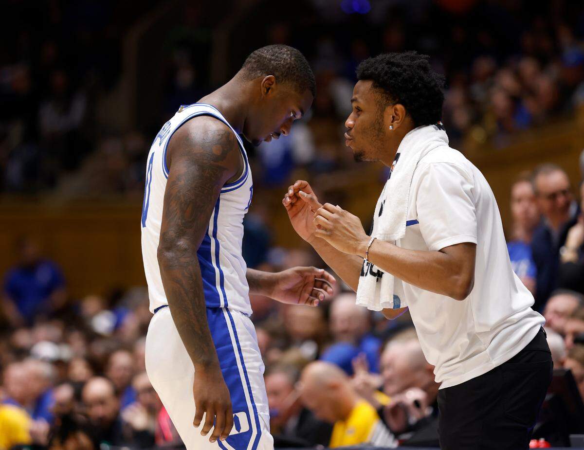 Duke’s Jeremy Roach and Dariq Whitehead have a word during the second half of the Blue Devils’ 77-69 win over Pittsburgh at Cameron Indoor Stadium on Wednesday, Jan. 11, 2023, in Durham, N.C.