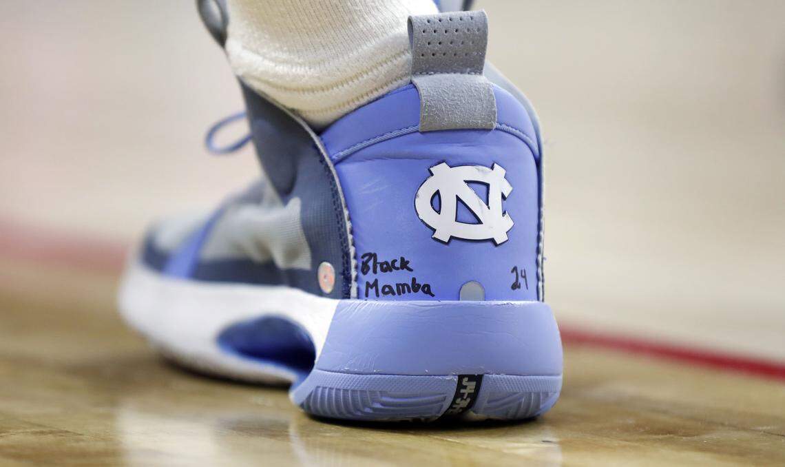 North Carolina’s Brandon Robinson wrote on his sneakers in remembrance of Kobe Bryant during N.C. State’s game against UNC at PNC Arena in Raleigh, N.C., Monday, Jan. 27, 2020.