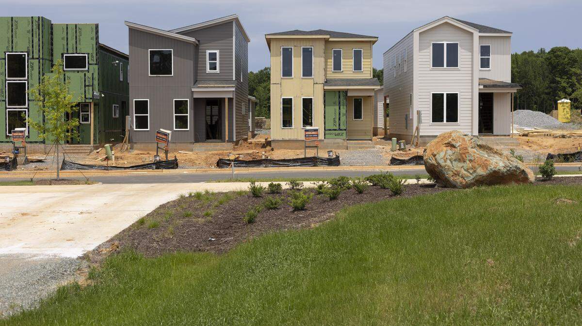 New homes under construction along Parkland Drive in the Chatham Park development on Tuesday, May 20, 2025 in Pittsboro, N.C.
