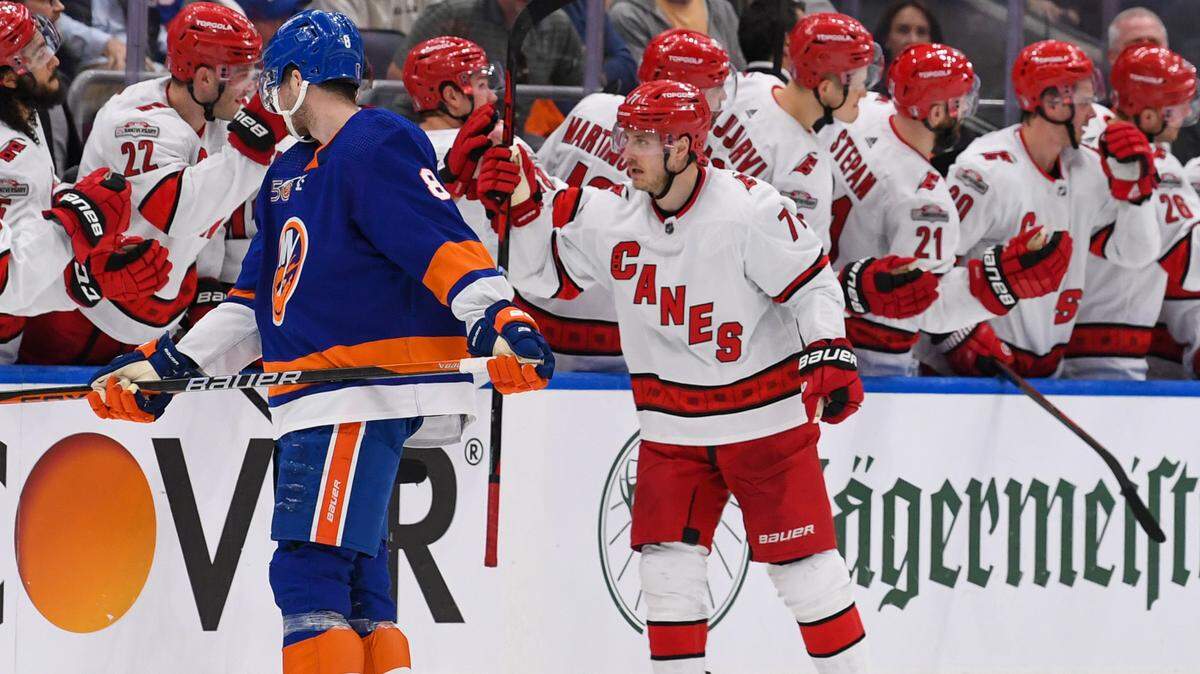 Carolina Hurricanes right wing Jesper Fast (71) celebrates his goal against the New York Islanders with the bench during the second period in game three of the first round of the 2023 Stanley Cup Playoffs at UBS Arena.