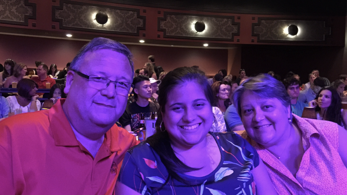 Joe and Amy Desormeaux with their daughter Olivia, center.