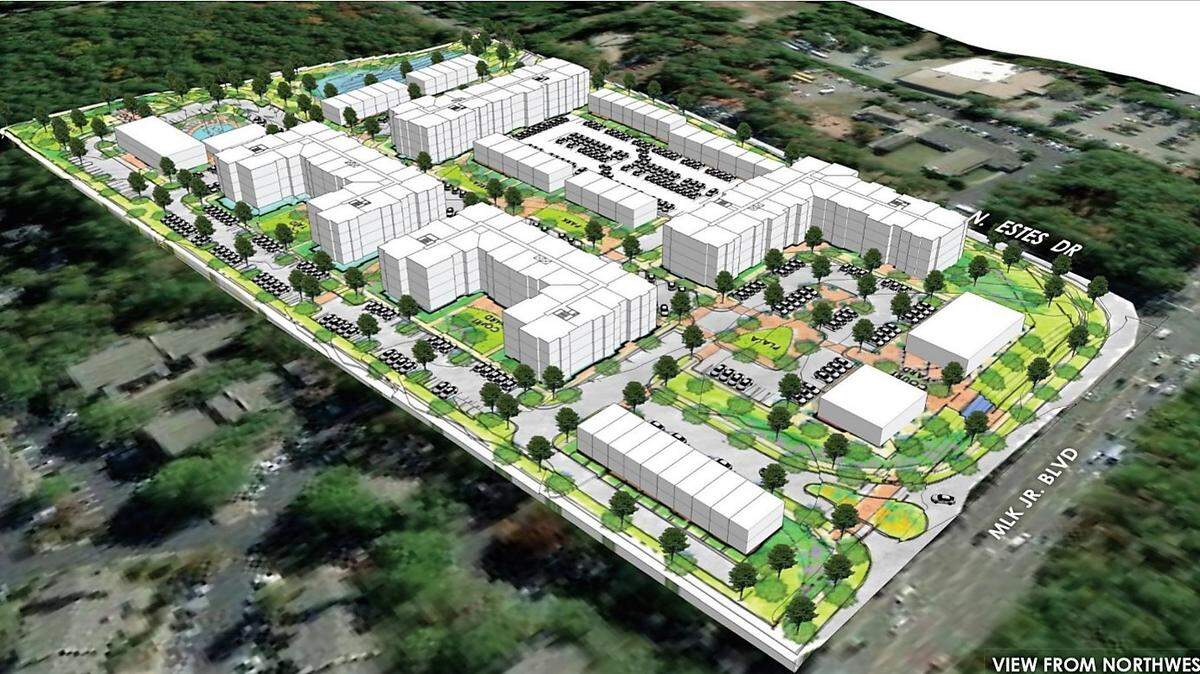 A model shows the Aura concept plan from Martin Luther King Jr. Boulevard, including a row of live-work units with ground-floor commercial space below two-story apartments (bottom center) and smaller retail buildings at the intersection.