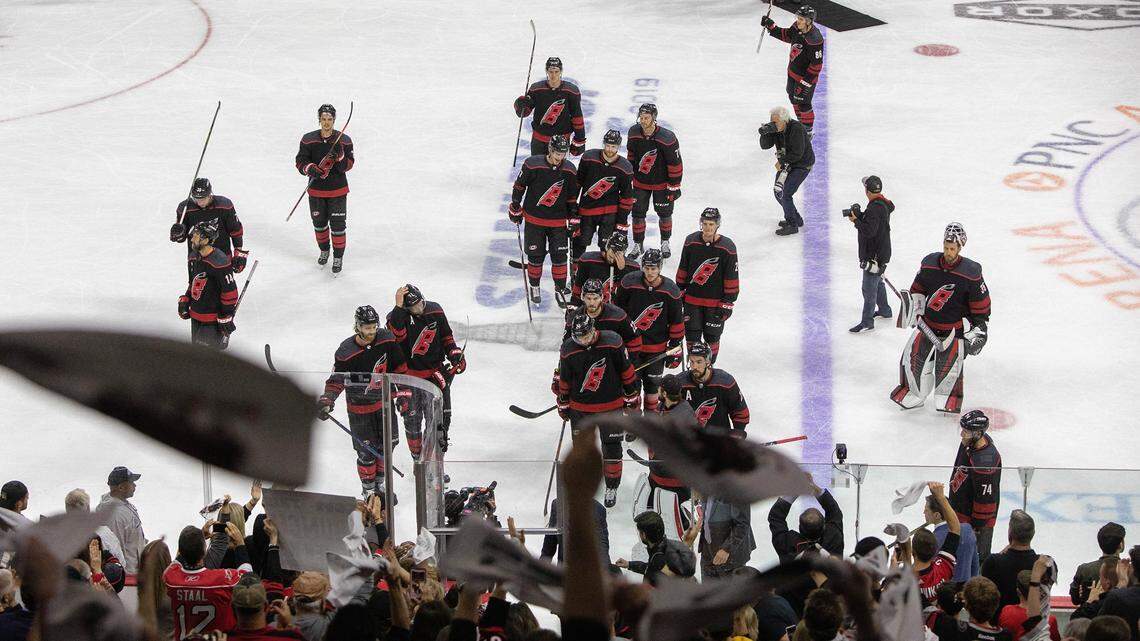 Fans cheer as a dejected Carolina Hurricanes team leaves the ice following Game 4 of the Eastern Conference Finals Thursday, May 16, 20019 at PNC Arena in Raleigh, NC. The Bruins won 4-0.