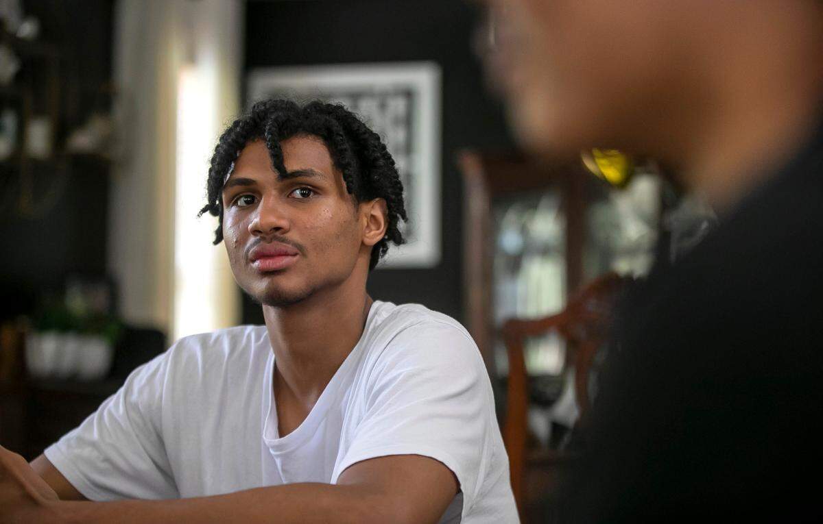 Jarin Stevenson listens to his father Jarod Stevenson as they discuss Jarin’s top three college choices on Thursday, June 15, 2023 in Chapel Hill, N.C. A top basketball recruit, seventeen-year-old Jarin is planning to reclassify and enroll early in college after completing his high school academic requirements at Seaforth High School.