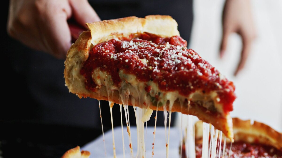 Uncle Tony’s stuffed pizza is from Nancy’s Pizzeria’s signature menu in Raleigh. The “thick, round pie has a high, crisp,golden crust ringed around a red sauce center” stuffed with italian sausage, pepperoni, green peppers, onions.