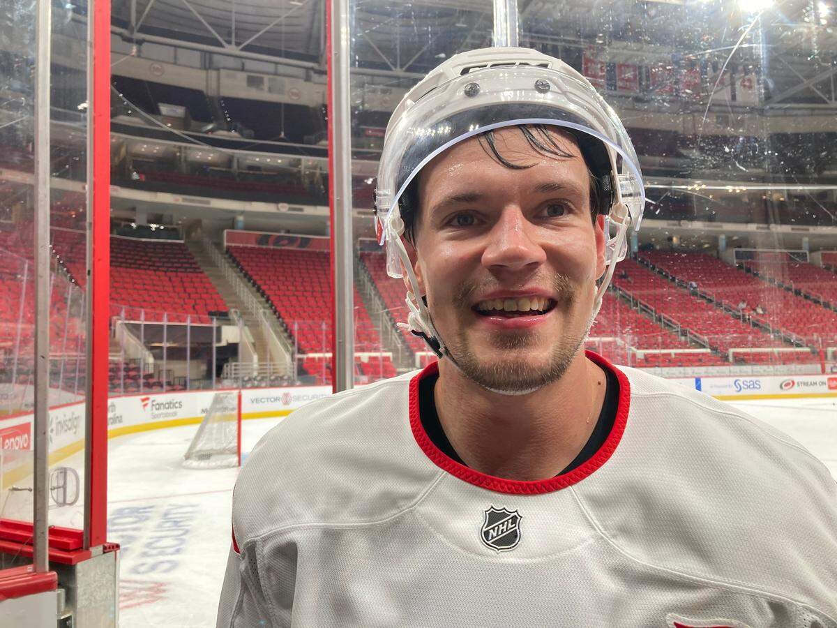 Carolina Hurricanes forward Juha Jaaska smiles as he leaves the ice following morning skate at Lenovo Center on Wednesday, Oct. 2, 2024.