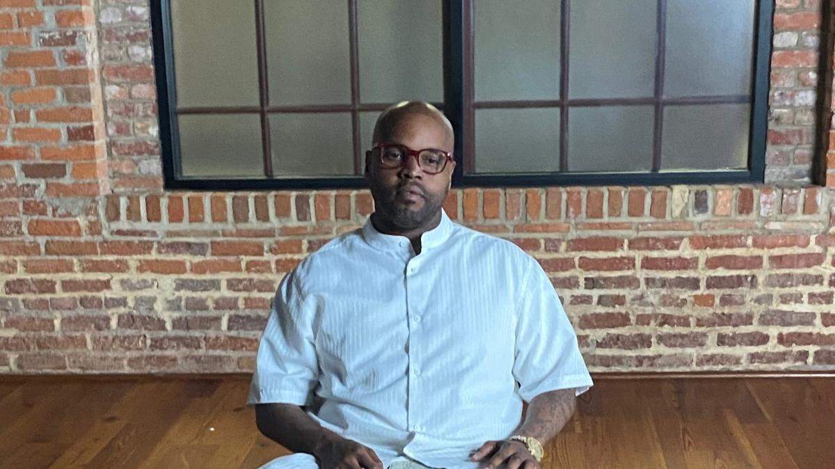 Durham exoneree Kevin Johnson, 40, sitting for an interview about wrongful convictions.
