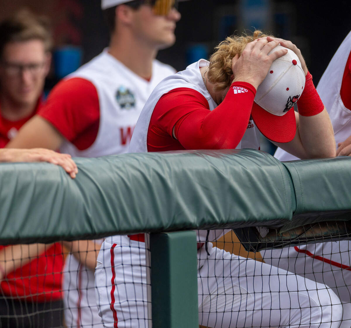 N.C. State second baseman Matt Heavner (6) hangs his head following the Wolfpack’s 5-4 season ending loss to Florida in game seven of the College World Series on Monday, June 17, 2024 at Charles Schwab Field in Omaha, Nebraska.