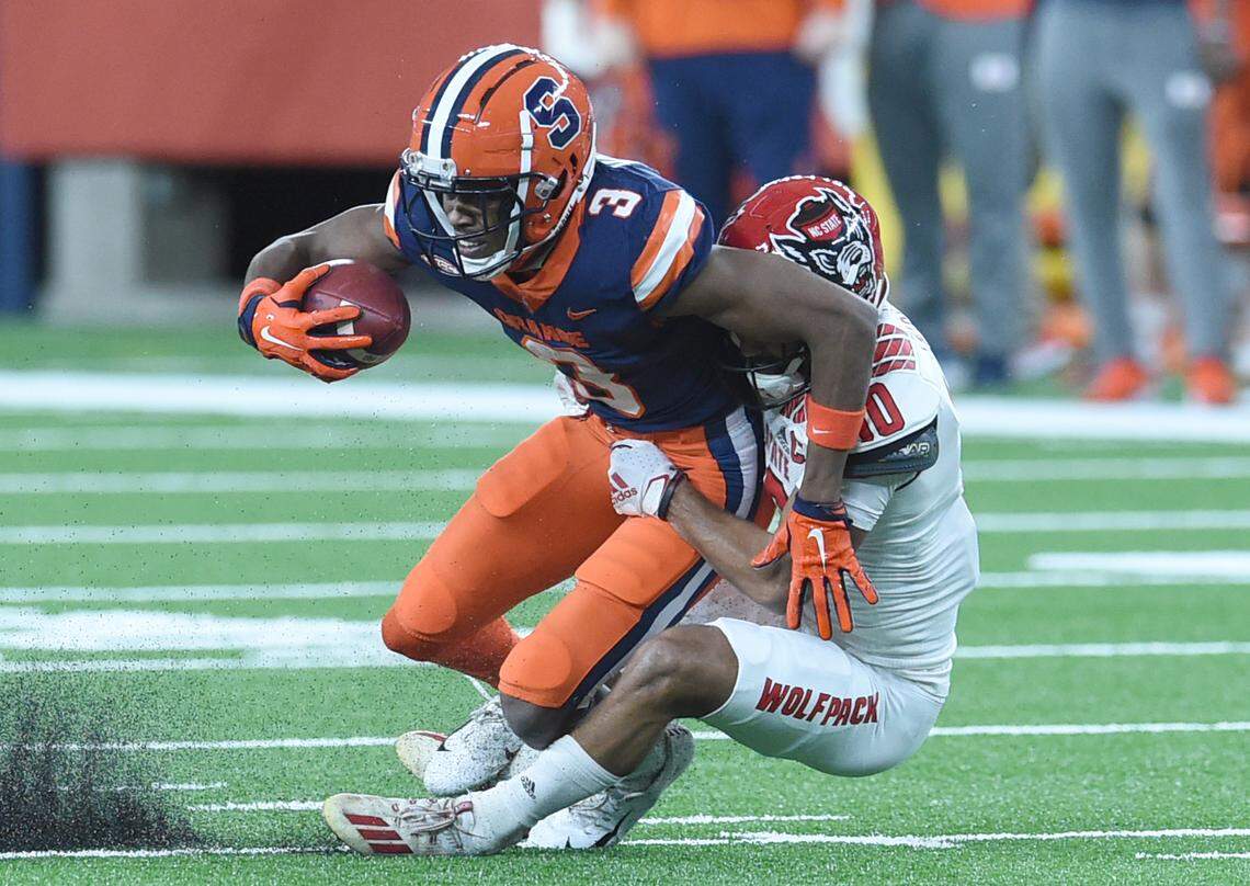 Syracuse Orange wide receiver Taj Harris (3) tries to get free during a game against North Carolina State on Saturday, Nov. 28, 2020, at the Carrier Dome in Syracuse, N.Y.
