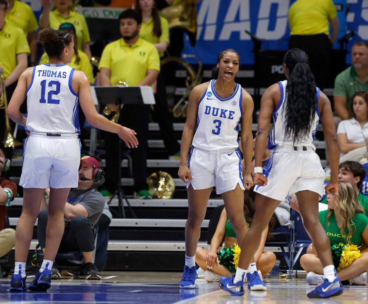 Duke’s Ashlon Jackson, center, reacts after a defensive stop during the second half of the Blue Devils’ 59-53 win over Oregon in the second round of the NCAA Tournament on Sunday, March 23, 2025, at Cameron Indoor Stadium in Durham, N.C.