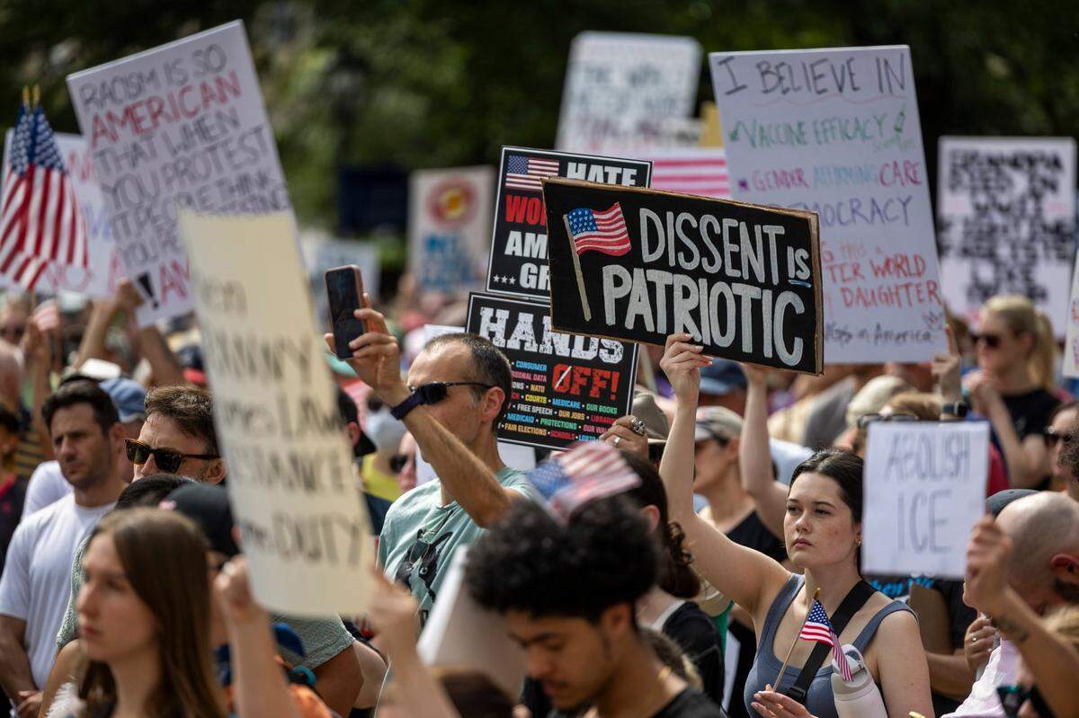 Hundreds of demonstrators rally at the North Carolina State Capitol on Saturday, June 14, 2025. The event was one of dozens held across the state and hundreds nationwide during what organizers called a nationwide day of defiance against the Trump administration.