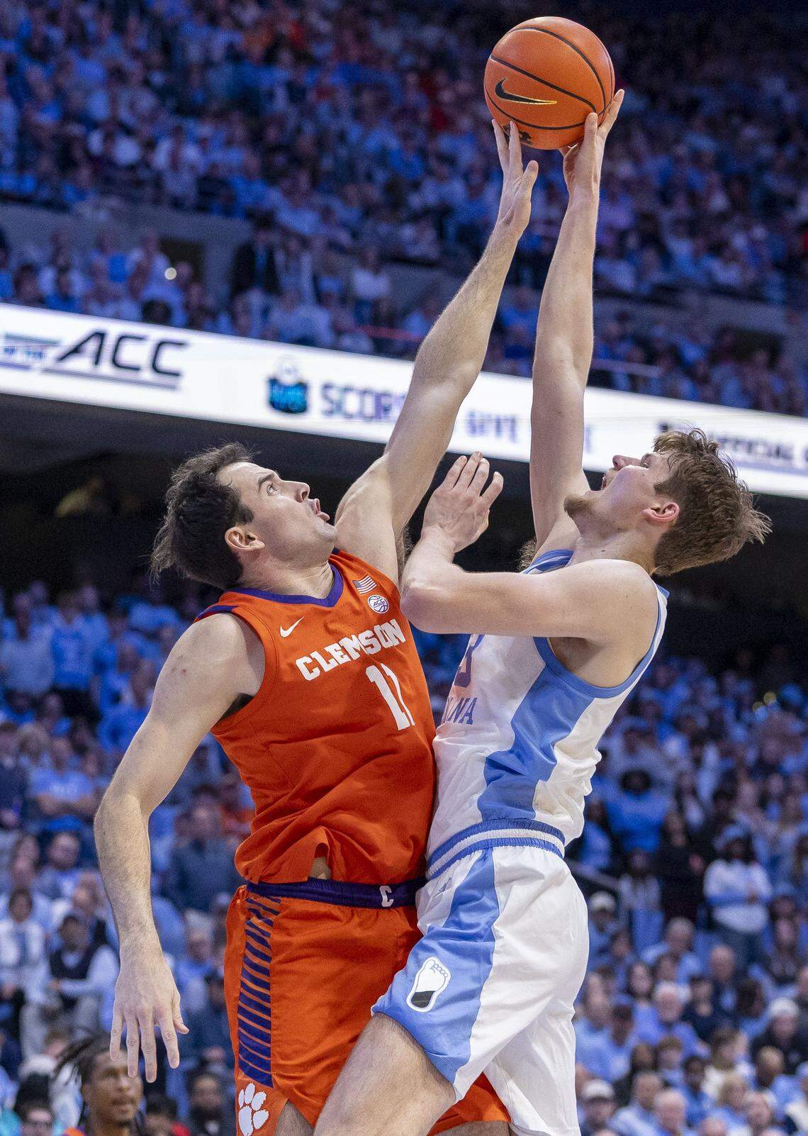 Clemson center Nick Davidson (11) defends North Carolina center Henri Veesaar (13) in the second half on Tuesday, March 3, 2026 at the Smith Center in Chapel Hill, N.C.