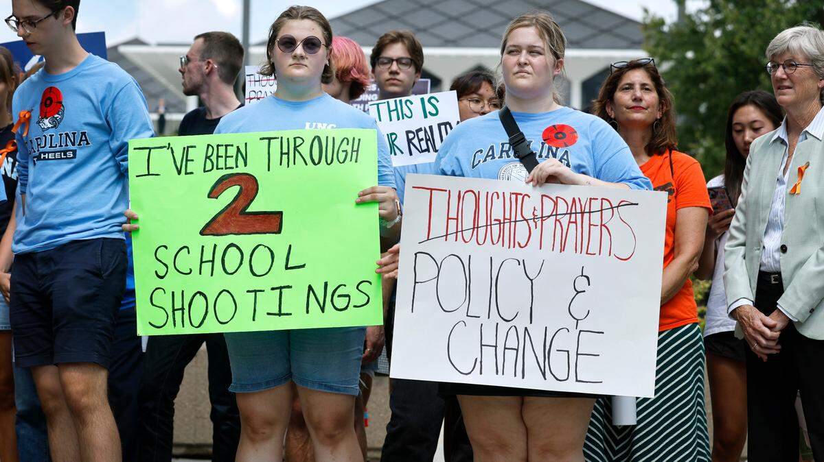 UNC freshmen Danielle Kennedy, left, and Amy Hyde attend a protest against gun violence sponsored by March for Our Lives UNC-CH outside the NC Legislative building in Raleigh, N.C., Tuesday, Sept. 12, 2023.