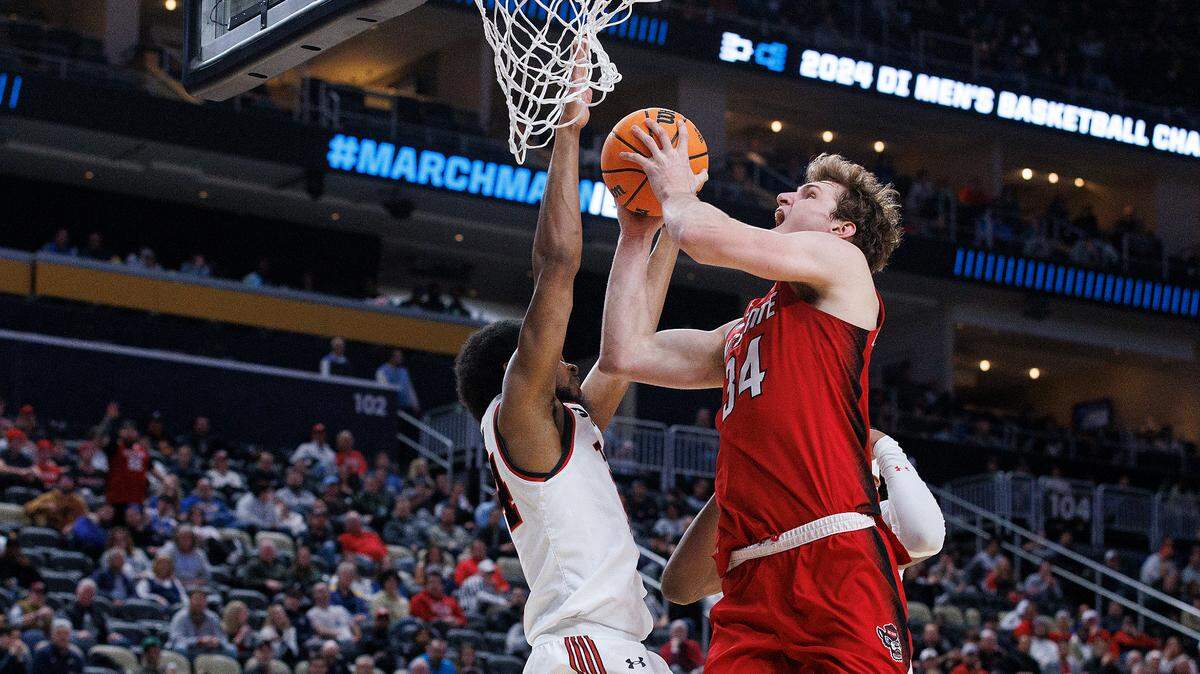 N.C. State’s Ben Middlebrooks drives to the basket against Texas Tech’s Kerwin Walton during the second half of the Wolfpack’s 80-67 win in the first round of the NCAA Tournament on Thursday, March 21, 2024, at PPG Paints Arena in Pittsburgh, Pa.