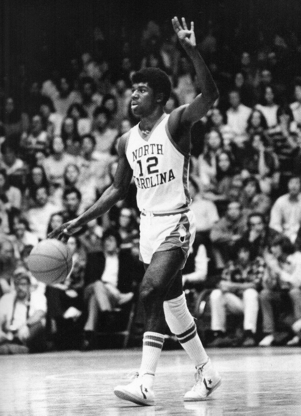 UNC point guard Phil Ford signals for the “four corners” offense.